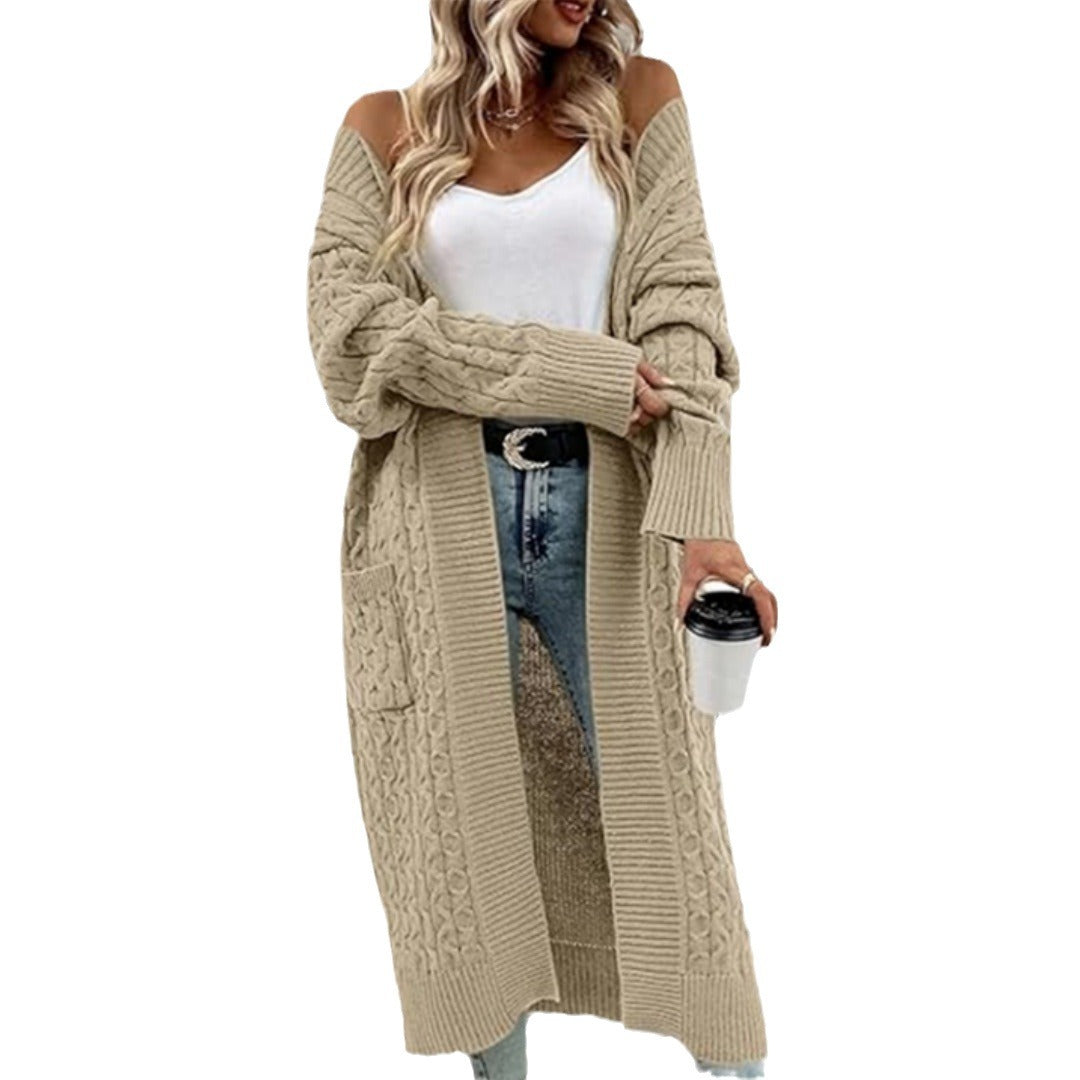 Women's knitted jacket with chunky braid design and practical pockets Lune London