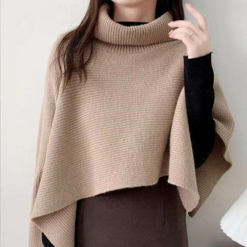 Ladies knitted poncho with high collar and asymmetrical cut Lune London
