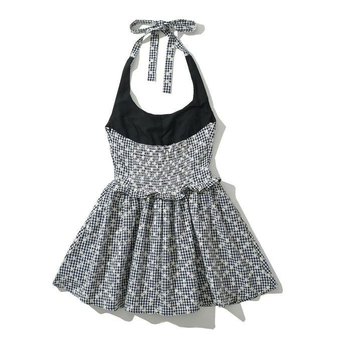 Leisure dress for ladies with a playful backless design and a floral plaid pattern Lune London