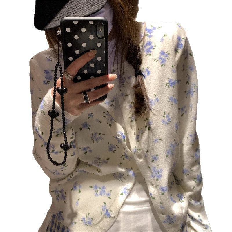 Cardigan féminin avec design floral et fermeture à boutons classique Chic & Stil