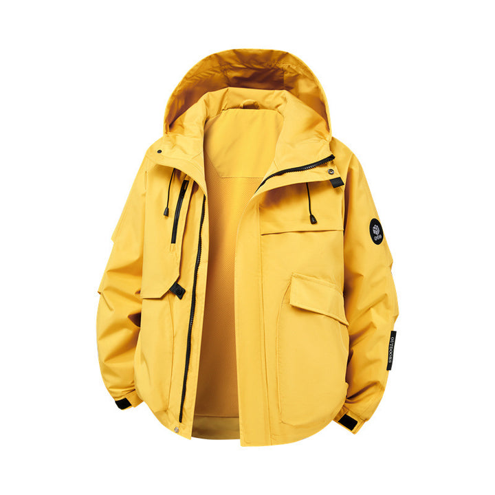Technical outdoor jacket for men in waterproof material with numerous zippered pockets Lune London