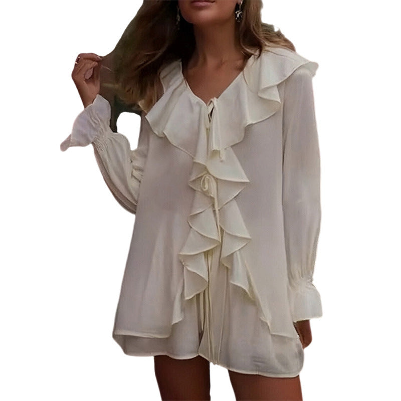 Blouse élégante pour femmes avec détails en volants et liens Chic & Stil