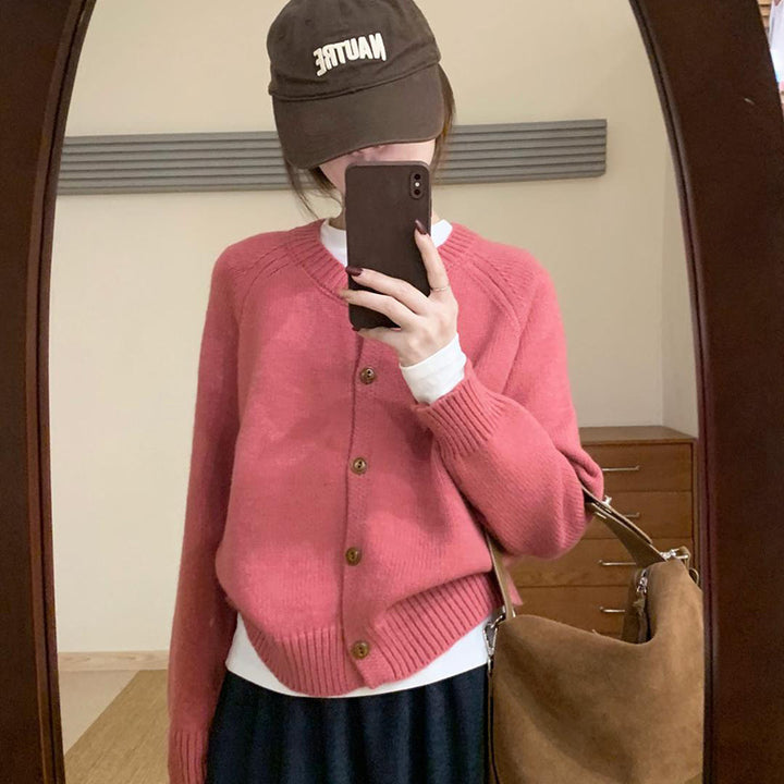 Comfortable knit sweater for women with button details and dropped shoulders Lune London