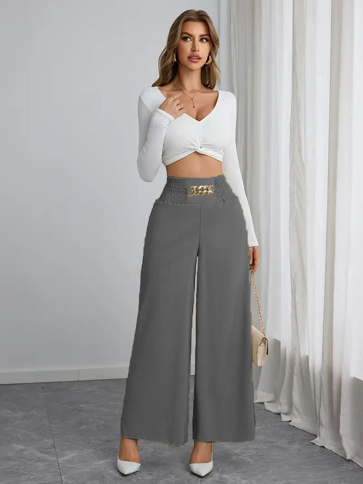 Wide palazzo trousers for women with elastic waistband and decorative belt Lune London