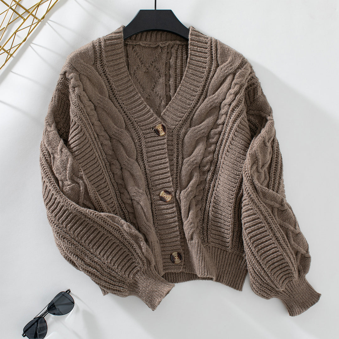 Women’s knitted jacket with a decorative braid design and a soft, textured material Lune London