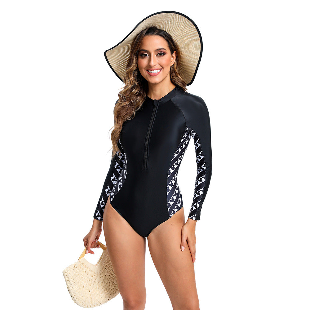 Sporty long sleeve swimsuit for women with modern zipper and stylish design Lune London.