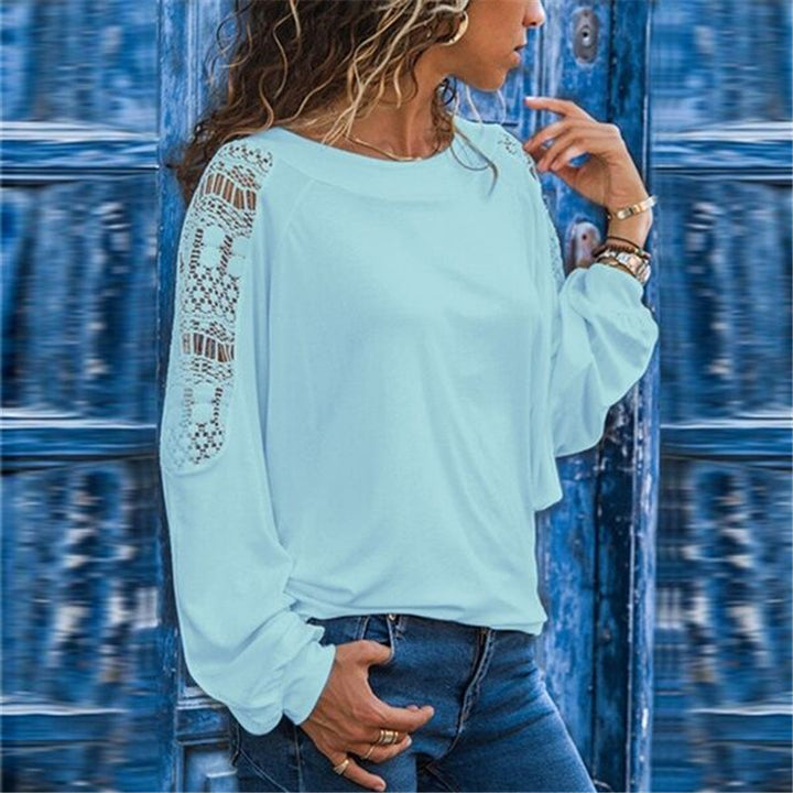 Top femme avec des manches en dentelle décoratives Chic & Stil