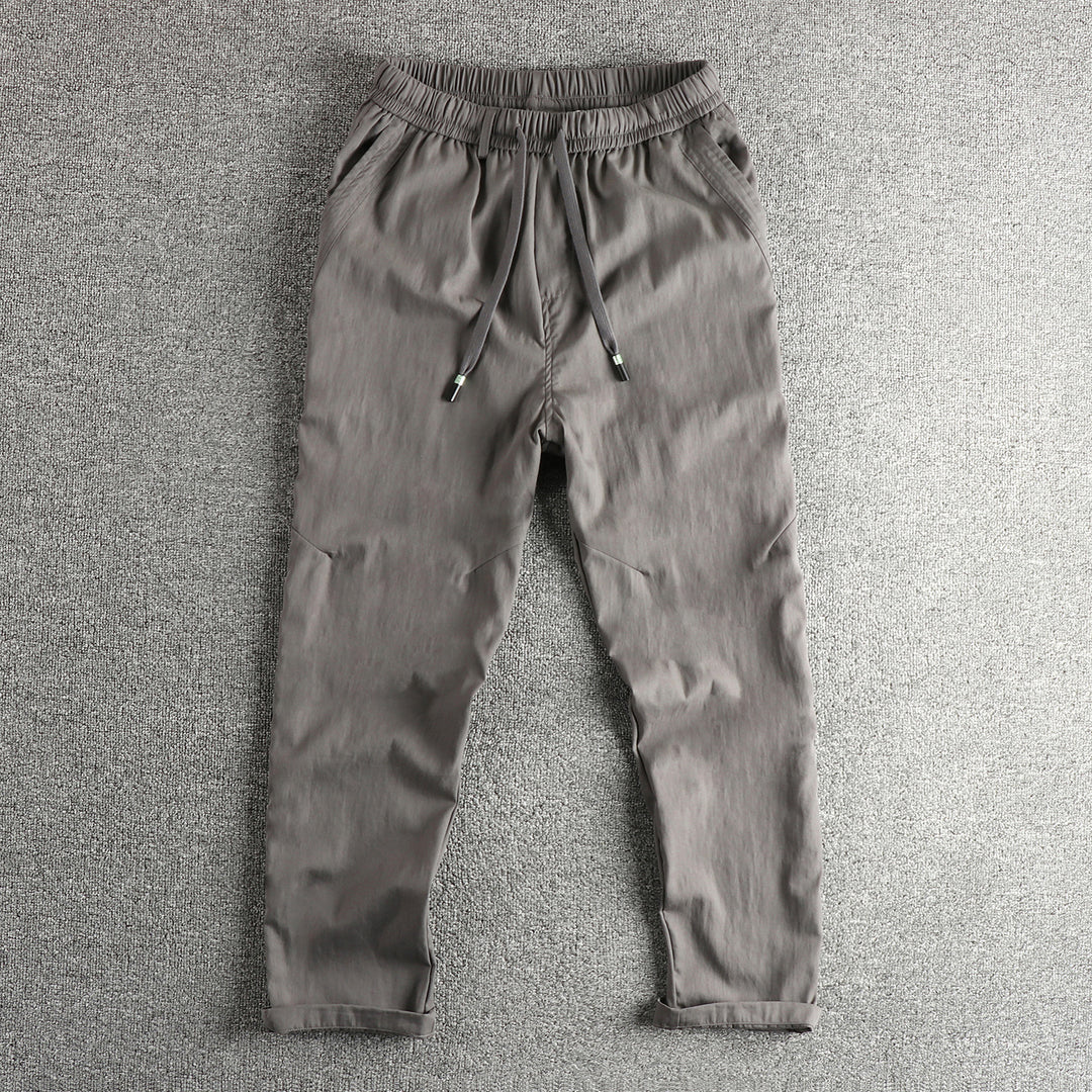 Men's athletic leisure pants with elastic waistband and practical drawstring Lune London