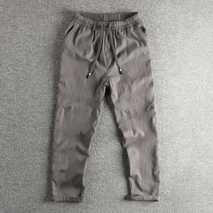 Men's athletic leisure pants with elastic waistband and practical drawstring Lune London