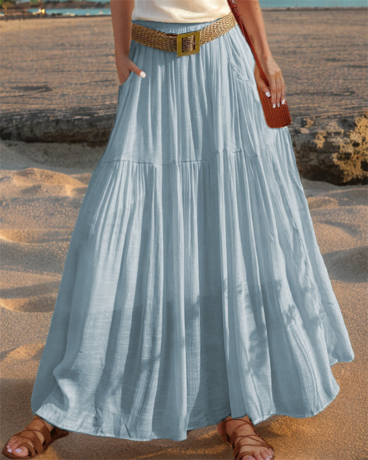 Maxi flared skirt for women with elegant pleated draping and practical pockets Lune London