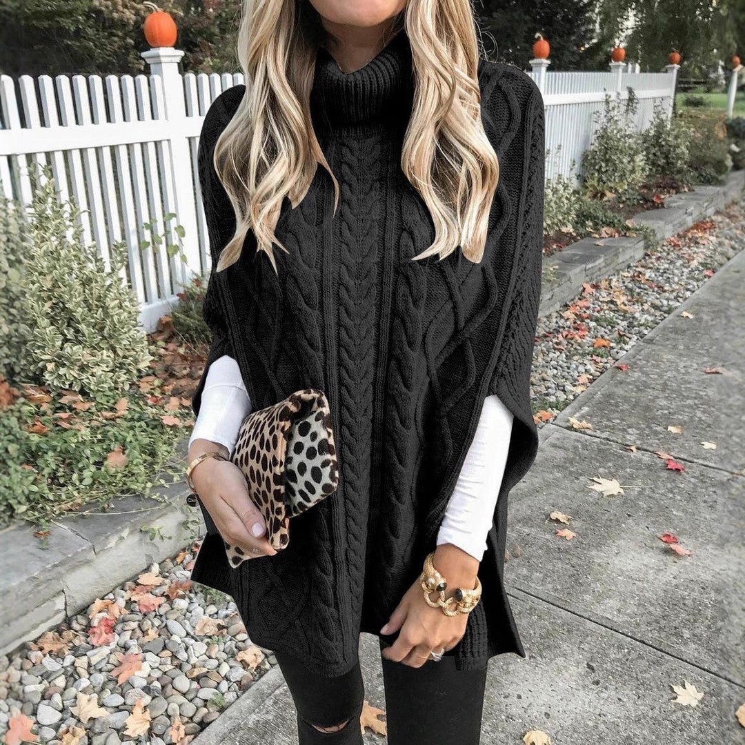 Ladies' knitted poncho with high collar and textured cable pattern Lune Londonl
