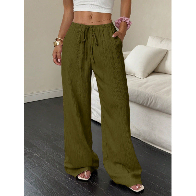 Casual and wide trousers for women with elastic waist and tie belt Lune London