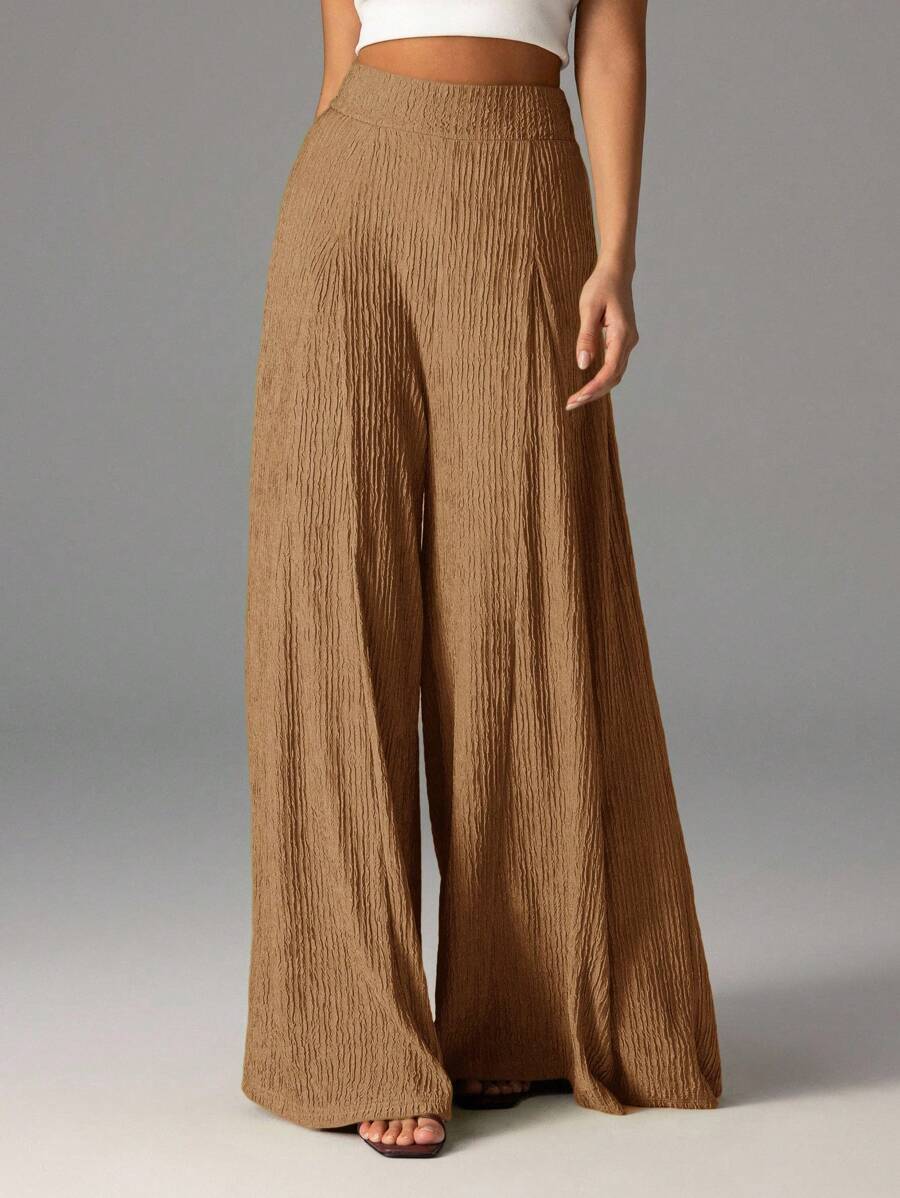 Wide pleated pants for women with high waist and elastic waistband Lune London