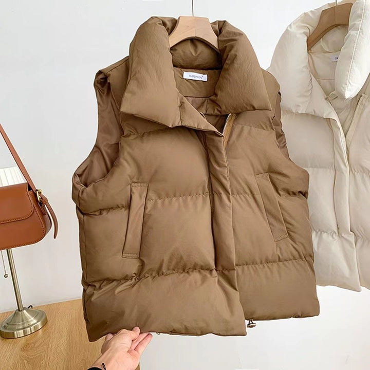 Ladies quilted vests with high collar and practical side pockets Lune London