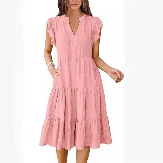 Leisure dress for women with ruffled details and pockets Lune London