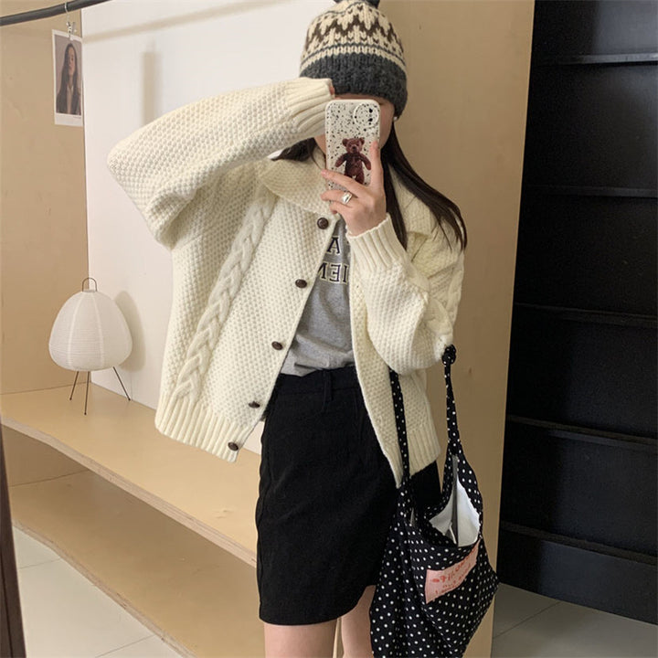 Women thick knit cardigan with contrasting buttons and a textured design Lune London