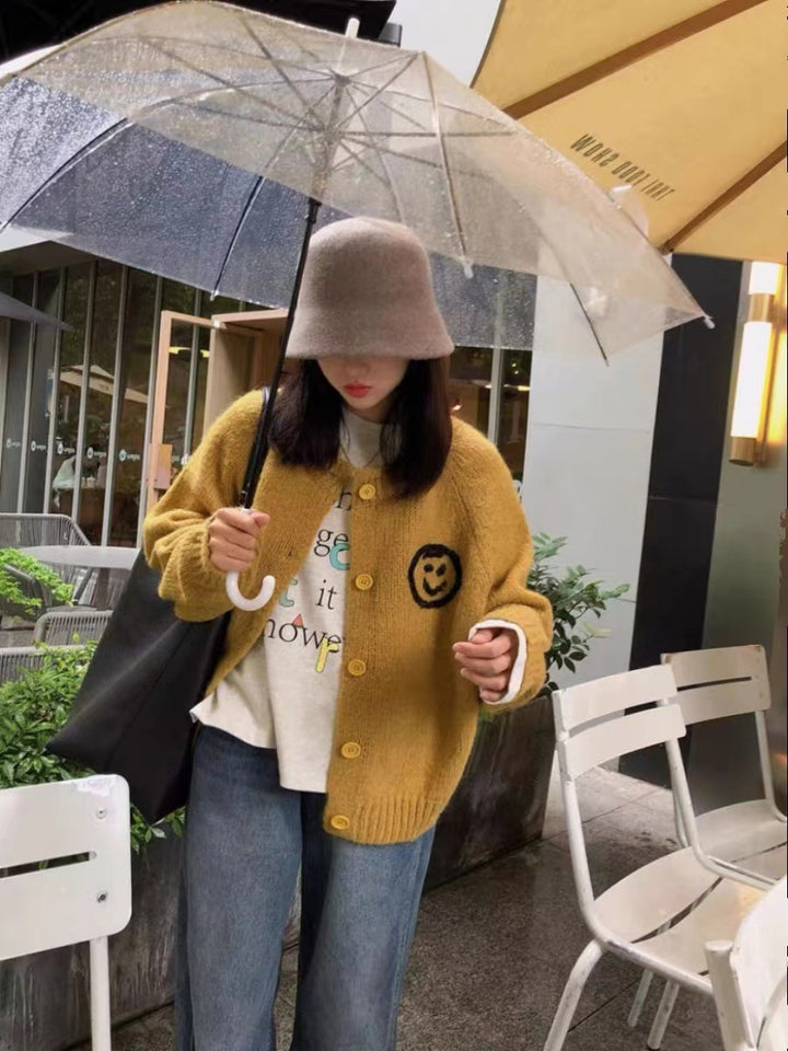 Women's cardigan and comfortable knit with playful Smiley pattern Lune London
