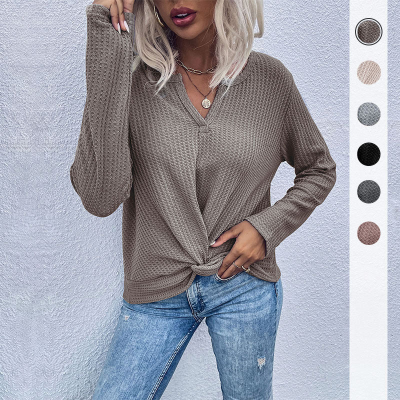 Women's casual long sleeve t-shirt with button details and textured design Lune London