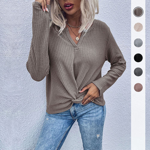 Women's casual long sleeve t-shirt with button details and textured design Lune London