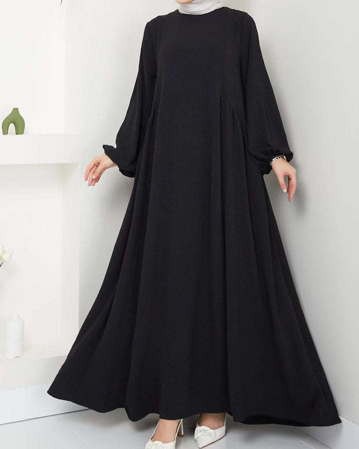 Elegant maxi dress for ladies with voluminous sleeves and a fluid cut Lune London