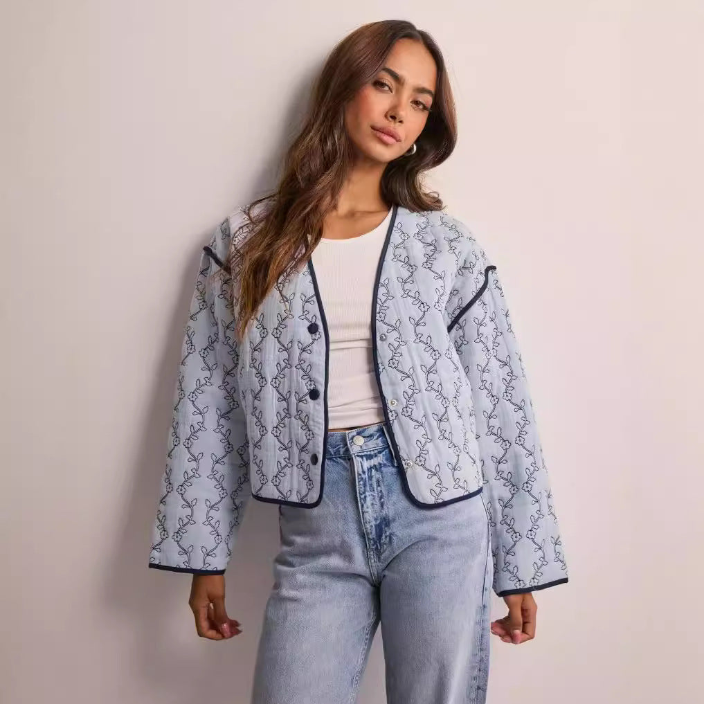 Veste matelassée pour femmes avec un motif graphique moderne et une coupe ajustée Chic & Stil