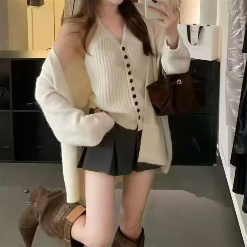 Cardigan en tricot épais pour femmes avec manches amovibles et détails en bouton Chic & Stil