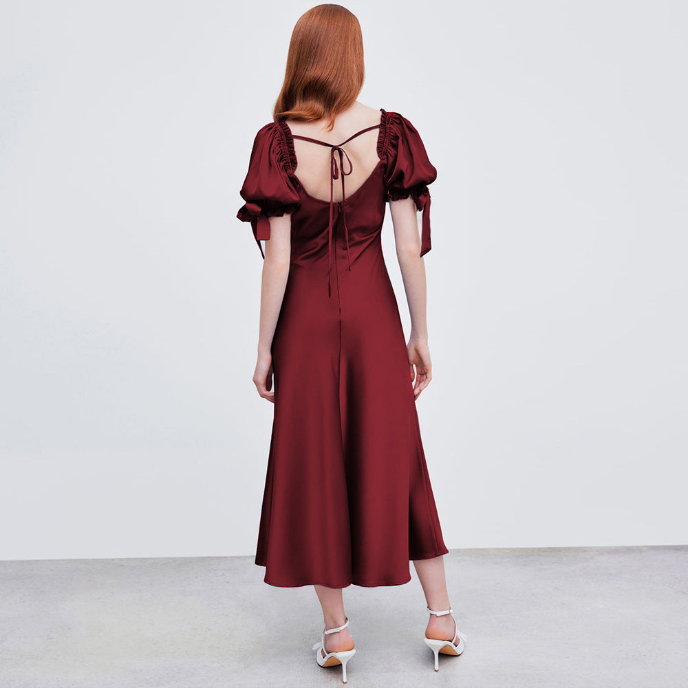 Robe midi pour femmes avec des manches bouffantes élégantes et un décolleté en V chic Chic & Stil