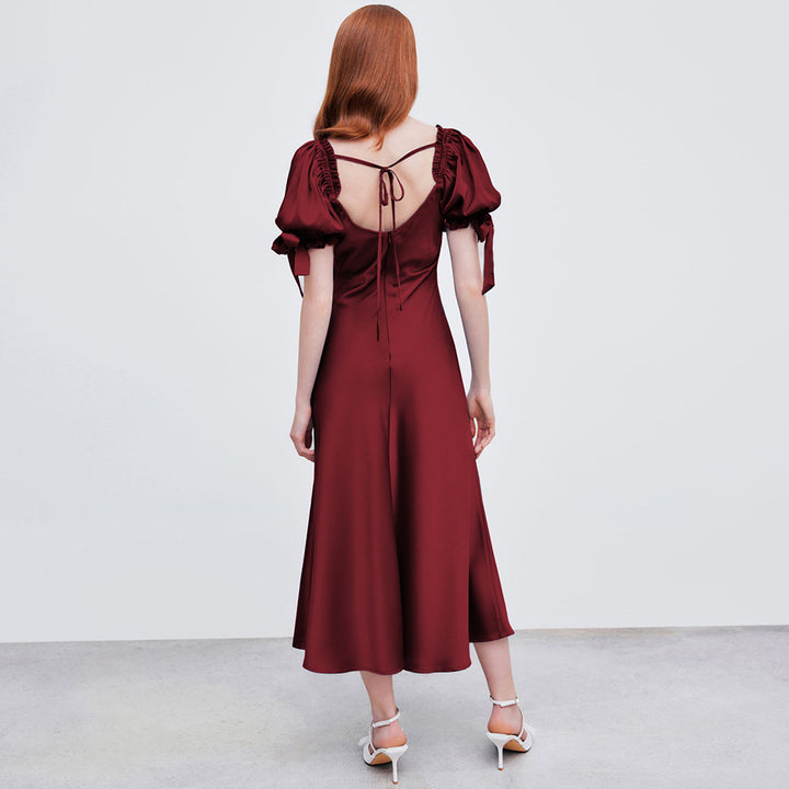 Robe midi pour femmes avec des manches bouffantes élégantes et un décolleté en V chic Chic & Stil