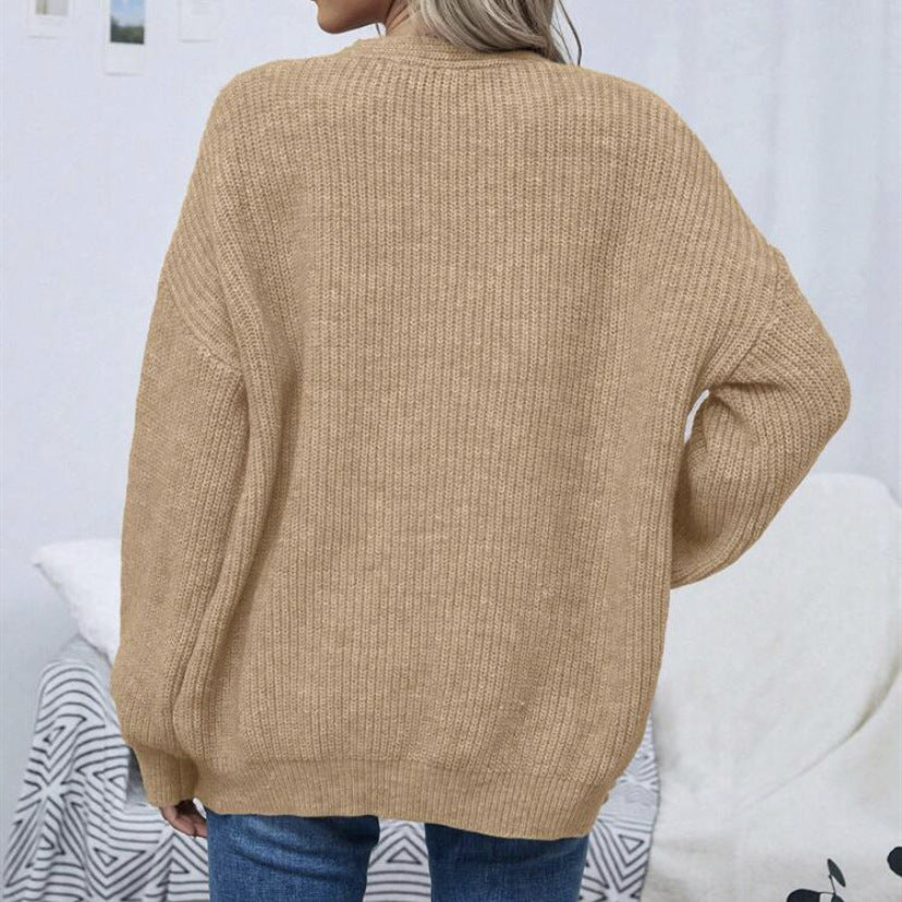 Ladies Large knitted cardigan with voluminous sleeves and an elegant chic structure