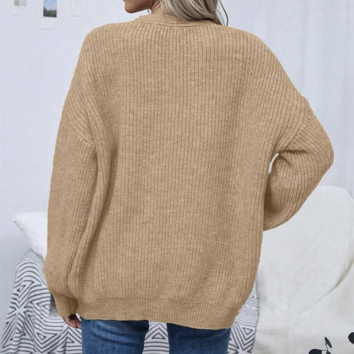 Ladies Large knitted cardigan with voluminous sleeves and an elegant chic structure