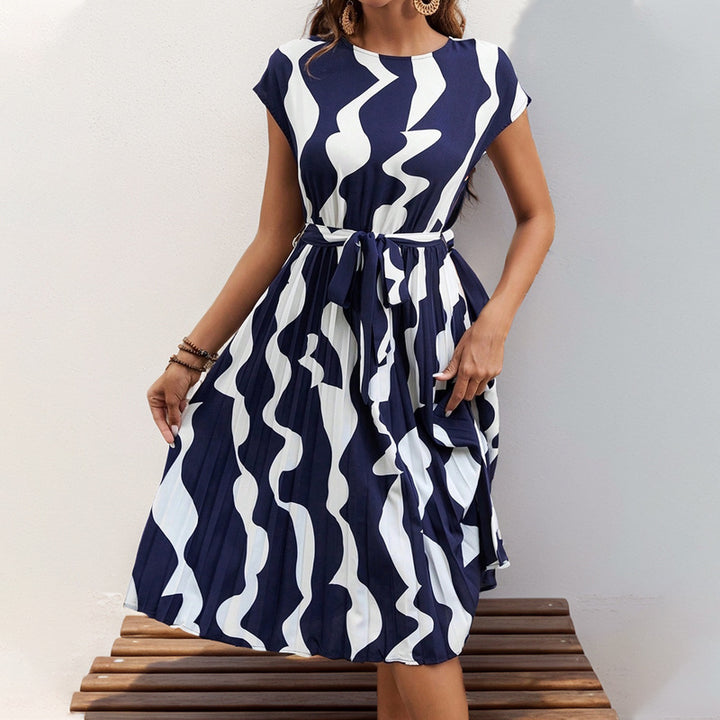 Lune London A-line pleated dress for ladies with abstract print and fitted belt