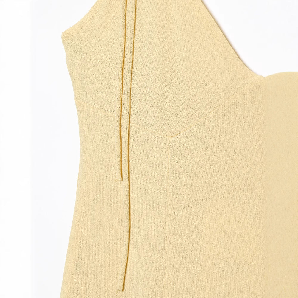 Maxi dress for women with voluminous ruffle details and adjustable spaghetti straps Lune London