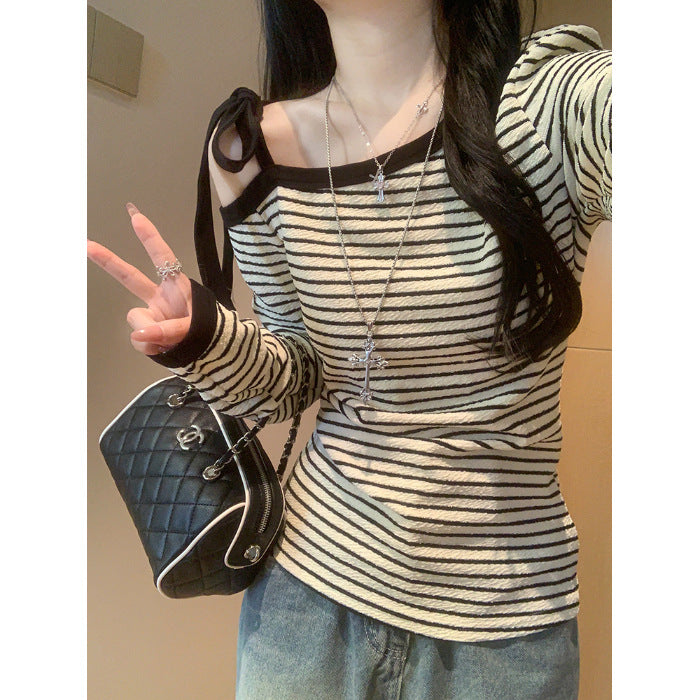 Ladies long sleeve top with off-shoulder design and fashionable stripes Chic & Stil