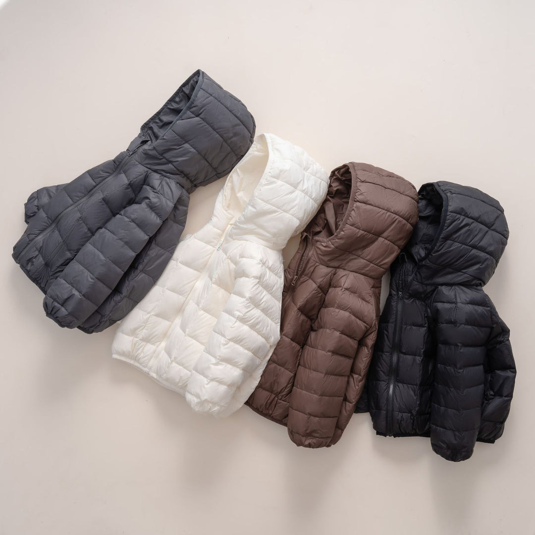 Ladies warm down jacket with hood and cross-quilted design Lune London
