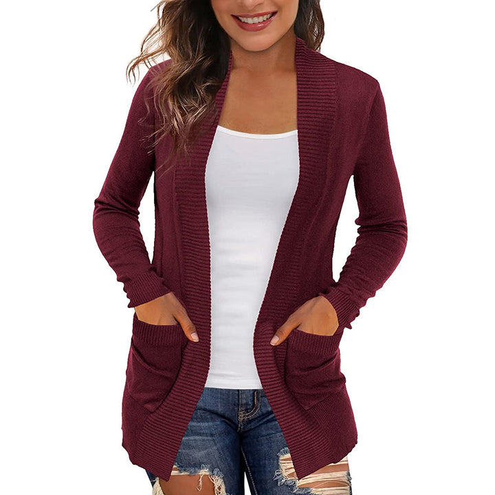 Knitted jacket for women with open sides and practical pockets Lune London