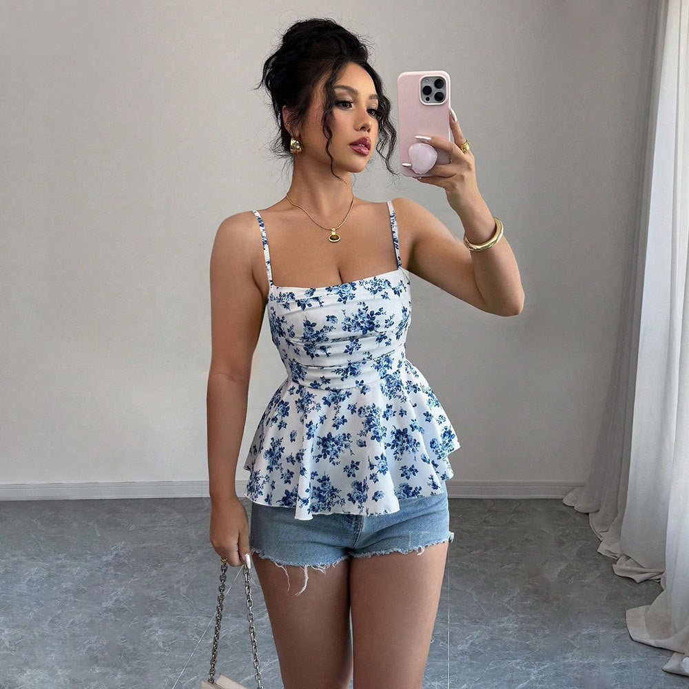 Elegant women's blouse with floral design and peplum cut Chic & Stil