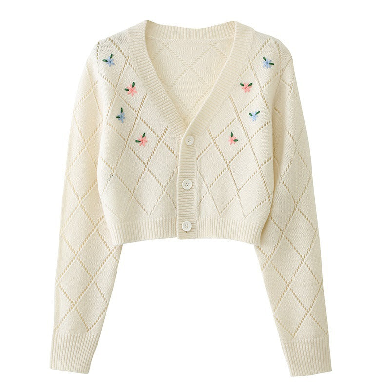 Ladies playful cardigan with diamond floral pattern and button detail Lune London