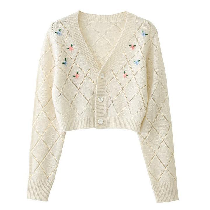 Ladies playful cardigan with diamond floral pattern and button detail Lune London