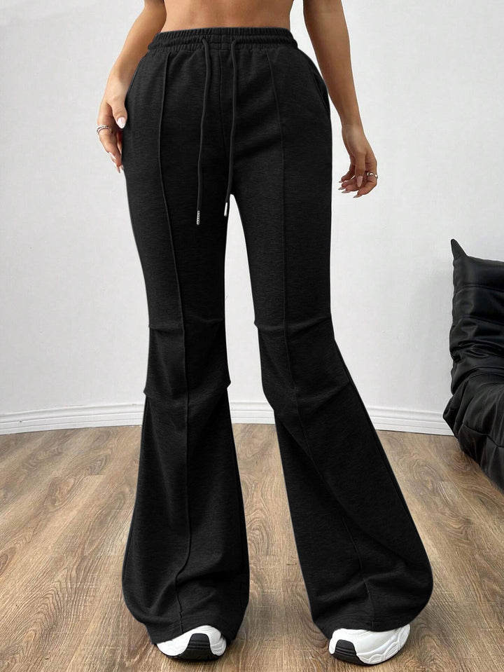 Pantalons de jogging larges pour femmes avec taille élastique et jambe évasée Chic & Stil