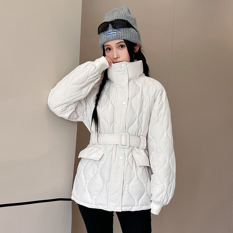 Fashion quilted jacket for women with a belted waist and practical pockets Lune London
