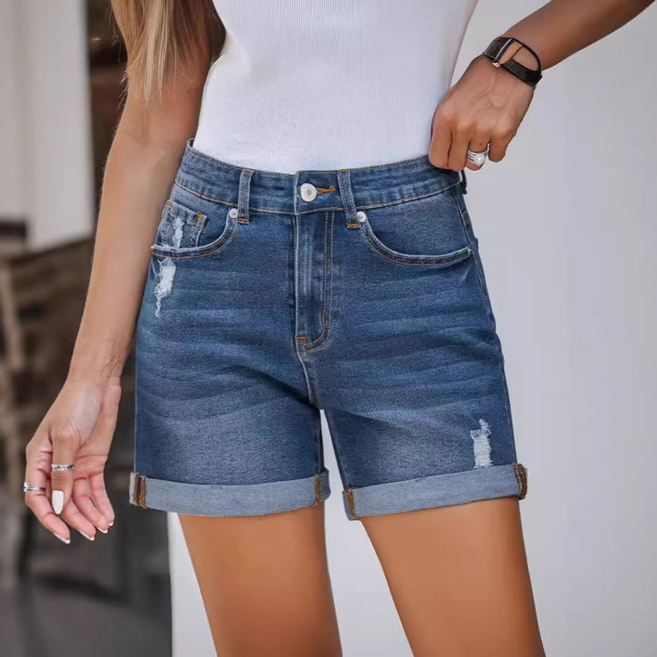 Women's denim shorts in a casual style with fashionable torn details Lune London