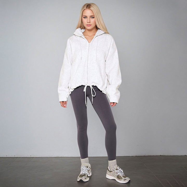 Sweat à capuche surdimensionné pour femmes avec cordon de serrage et poches latérales Chic & Stil