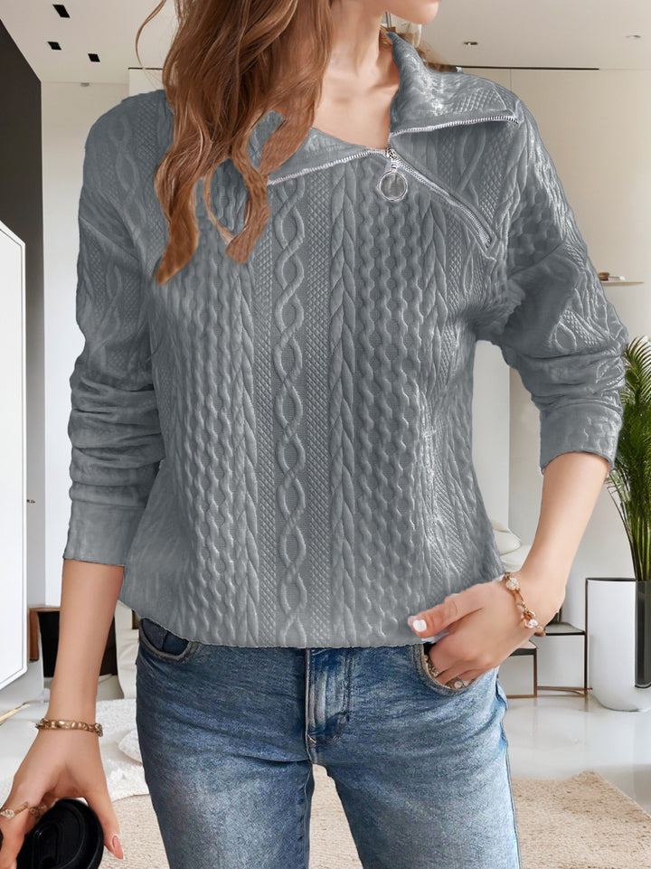 Casual knitted women's sweater with short zipper and textured surface Lune London