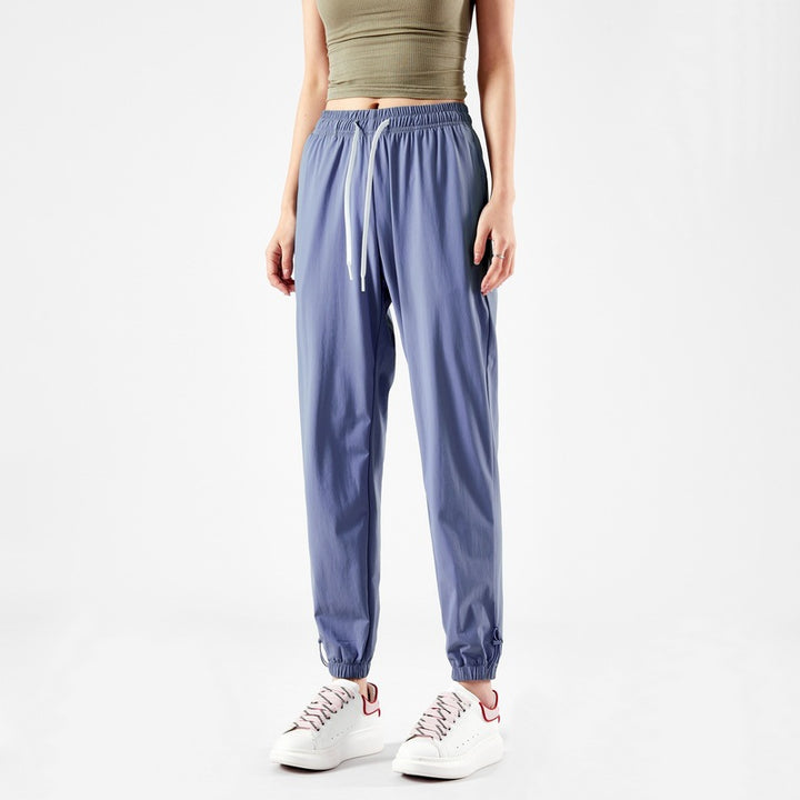 Light sport pants for women with elastic waist and practical pockets Lune London