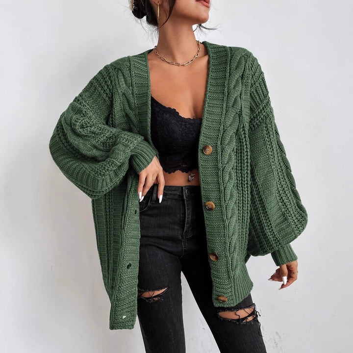 Oversized knitted cardigan for women with an elegant cable pattern and practical buttons Lune London