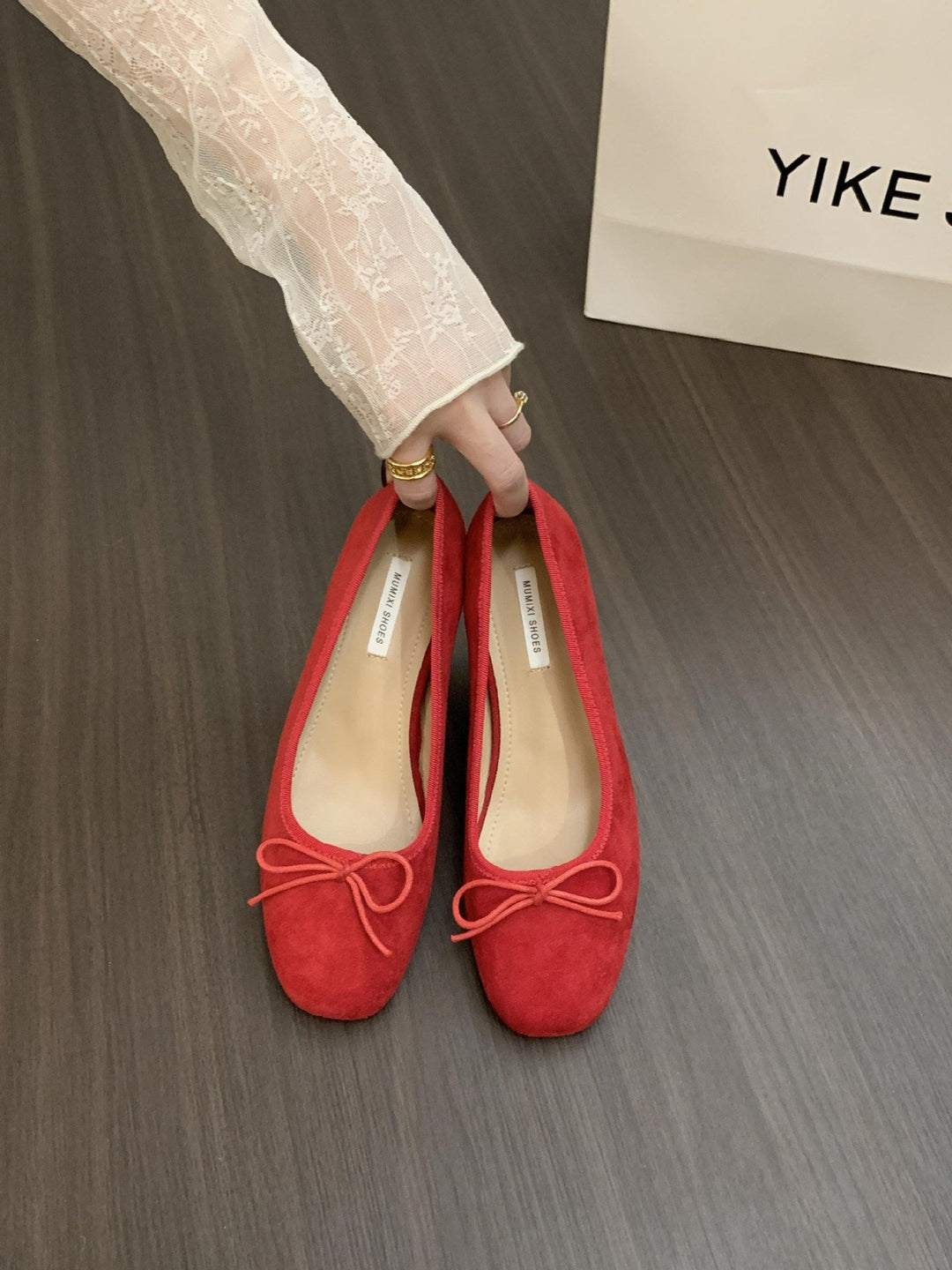 Women's ballerinas with delicate bow detail and velvety surface texture Lune London