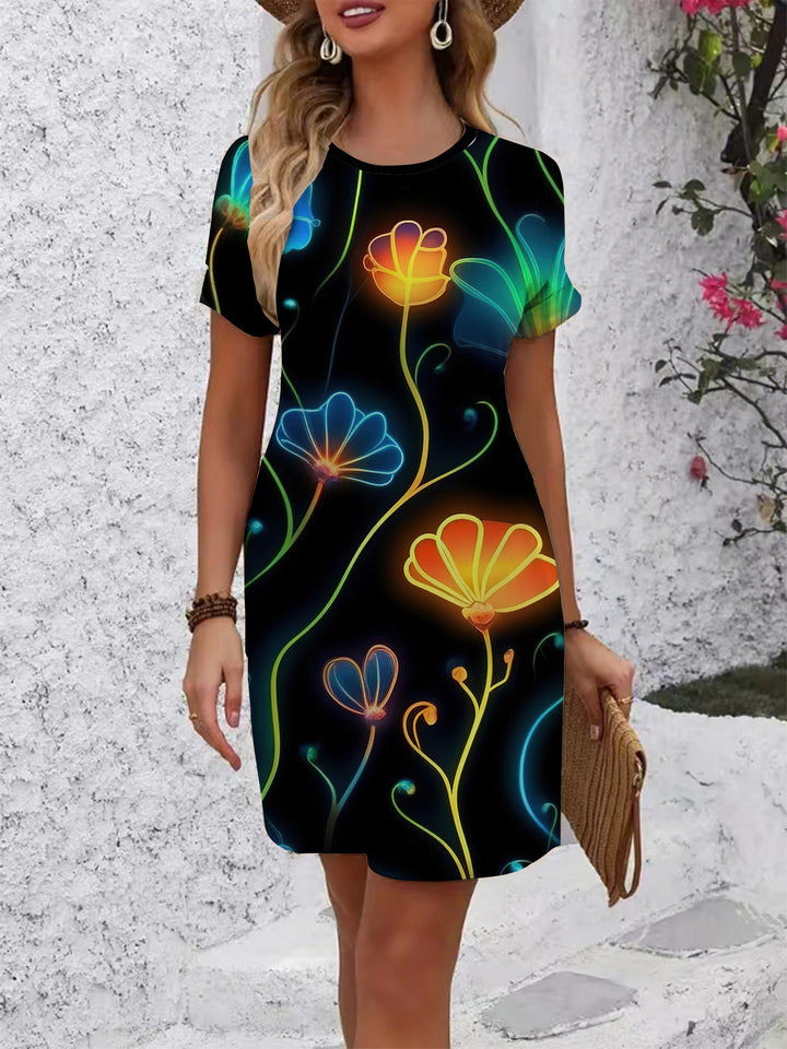 Women's comfortable casual dress with vibrant floral pattern and loose fit Lune London