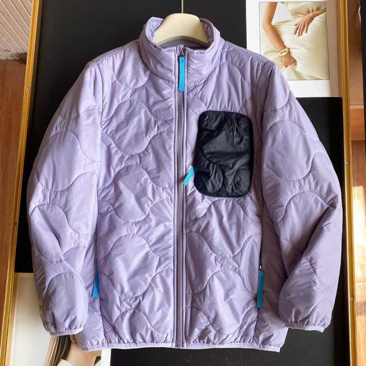Veste matelassée légère pour femmes avec col haut et poches pratiques Chic & Stil