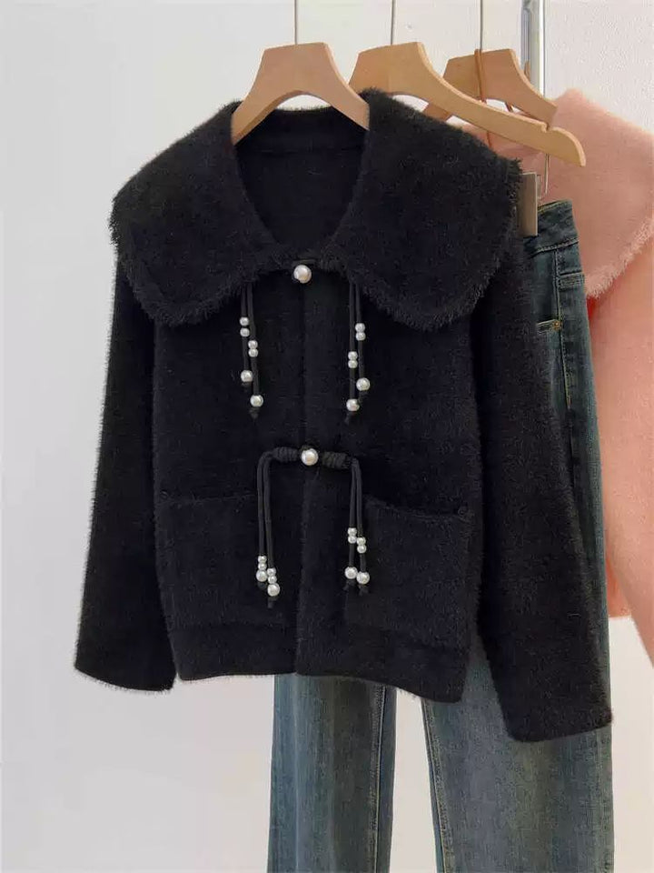 Cardigan féminin élégant avec détails en perles Chic & Stil