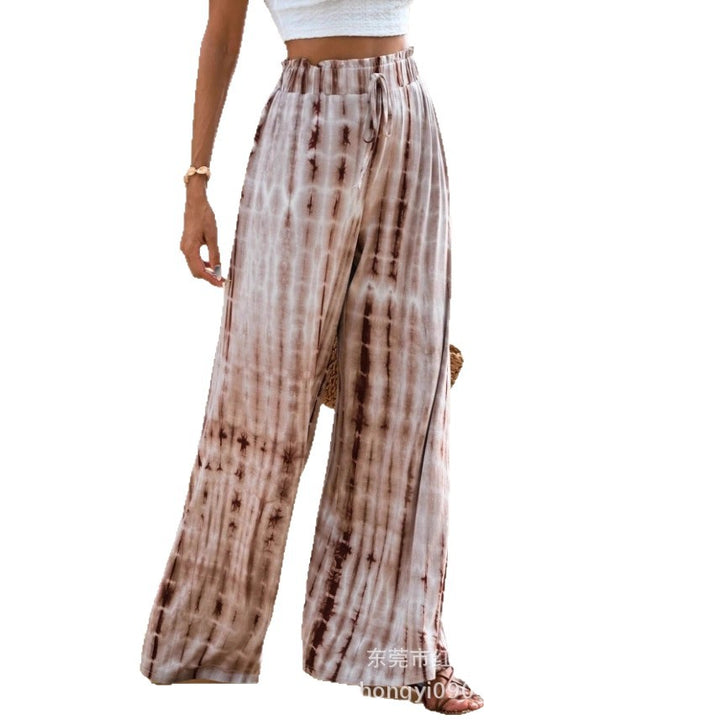 Pantalon d'été ample pour femmes avec taille élastique et motif batik unique Chic & Stil